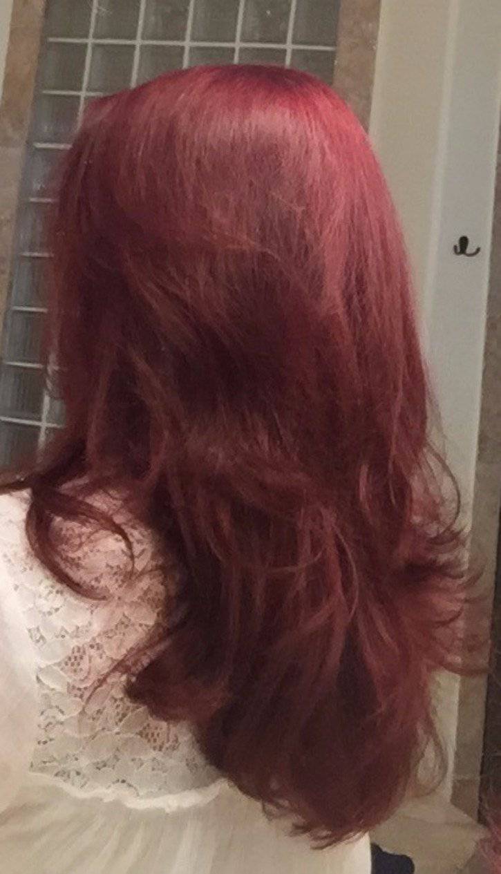 Hair growth shampoo results on dark red wavy curls