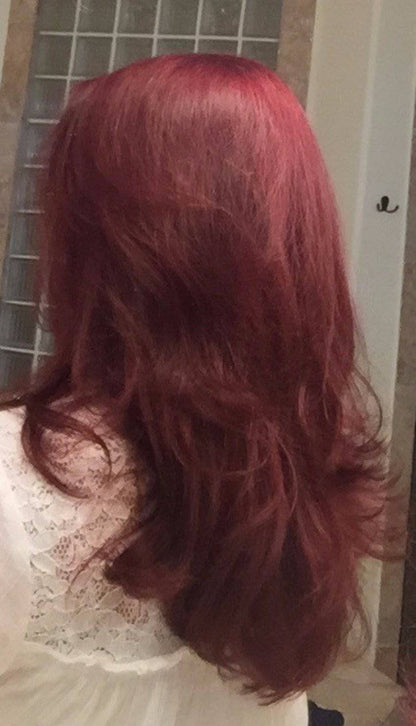 Hair growth shampoo results on dark red wavy curls