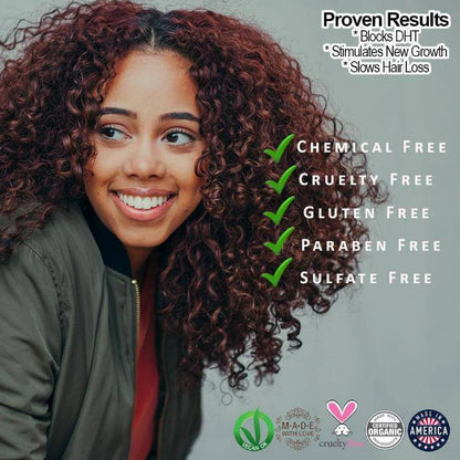 Woman with dark red curly hair and green checkmark claim badges