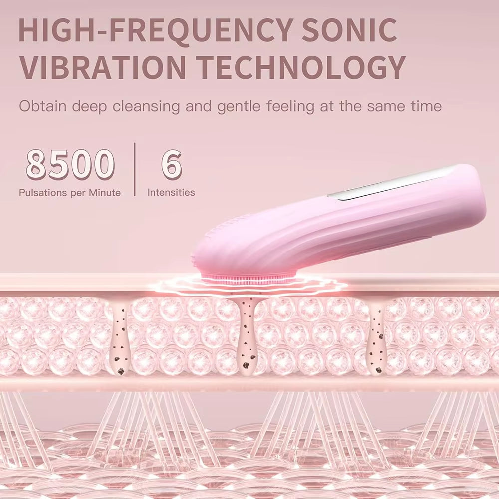 Pink sonic facial cleansing brush with dense circular bristle pads