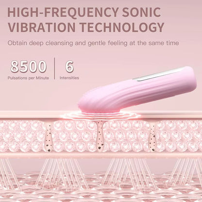 Pink sonic facial cleansing brush with dense circular bristle pads