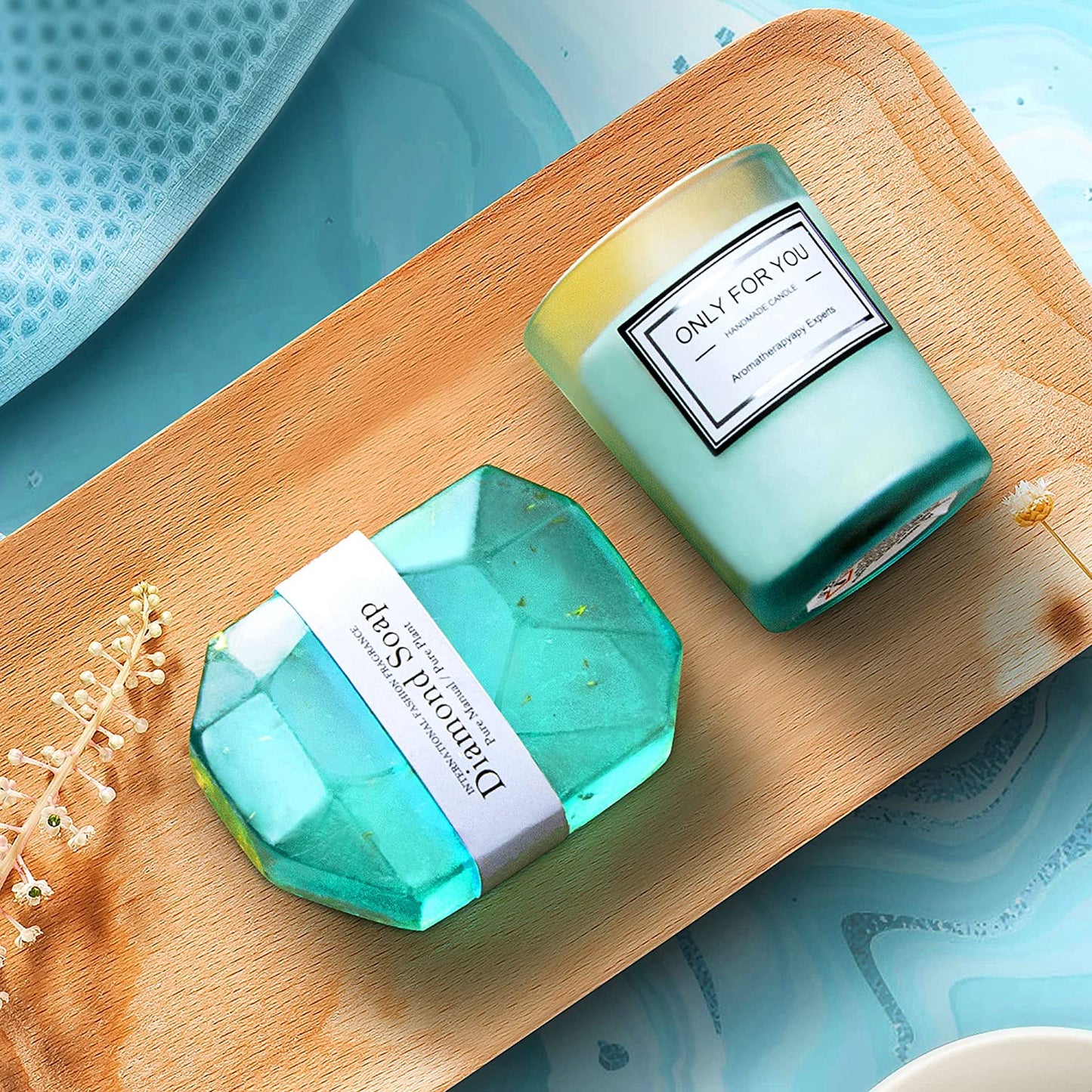 Diamond soap bar and soap piece on wooden tray, teal spa gift set contents