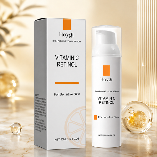 Skin firming serum bottle and box, white with orange accents and label typography