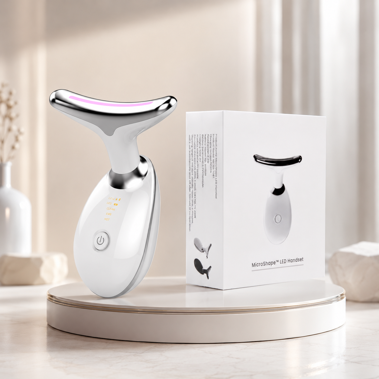 Wavy Chic microcurrent facial device, white body with chrome handle and LED ring