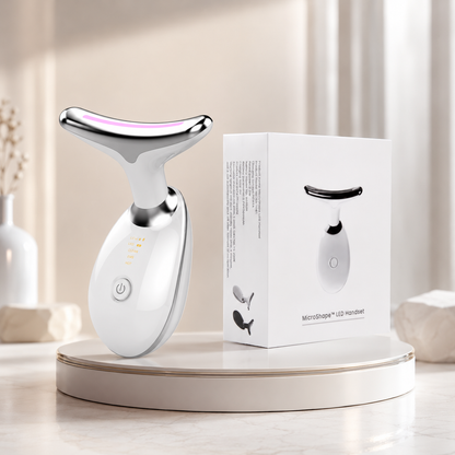 Wavy Chic microcurrent facial device, white body with chrome handle and LED ring