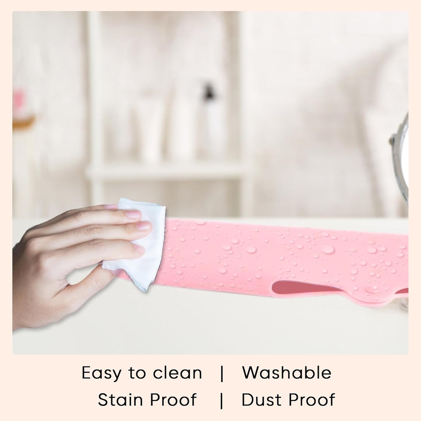 Pink silicone makeup sponge with water droplets and wipe-clean texture