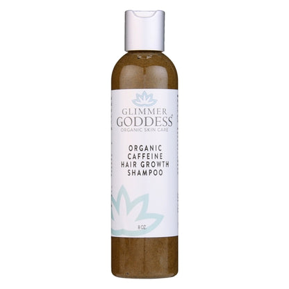 Caffeine hair growth shampoo bottle, amber liquid in white label container
