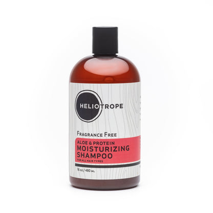 Shampoo bottle, fragrance-free; aloe & protein moisturizing; amber liquid, black cap.